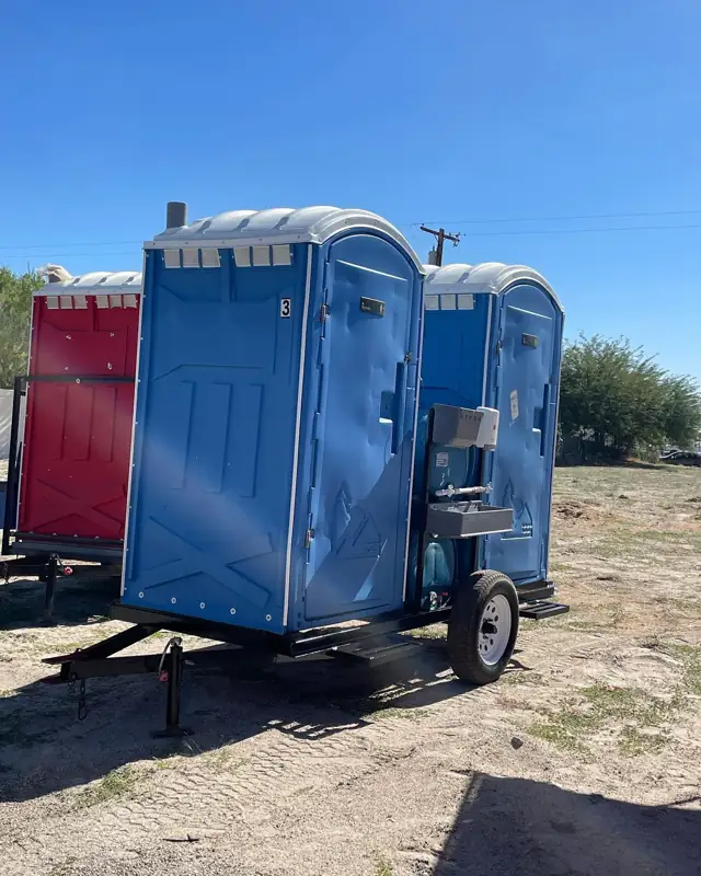 Porta potties on a towable trailer